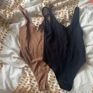Two Bodysuits - size small